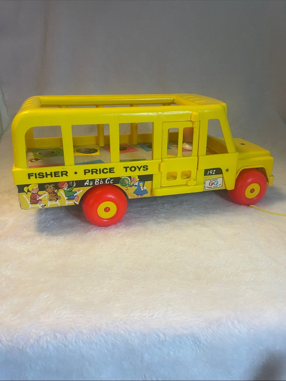 Fisher-Price Vintage Yellow School Bus 192 Pull Toy with Red Wheels